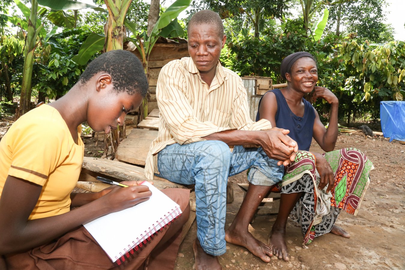 Ghana_FSP_Kumasi_Tom Maruko_Christie writing her dad's name in the book(10)(2)